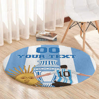 Round blue-and-white rug with custom text and sun face plus illustrated Argentina figure design