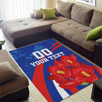 Blue area rug with red flowers and diagonal stripes, '00 YOUR TEXT' in center