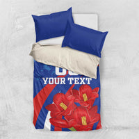 Blue bedding set with pillowcases and red flowers, showing '00 YOUR TEXT' front panel