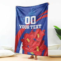 Custom lapageria blanket with blue field, red stripe, red flowers, and '00 YOUR TEXT'.