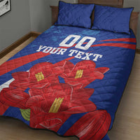 Blue quilt bed set with red stripe, big "00" and custom text over red flower print