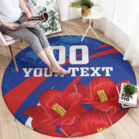 Round blue rug with red flower design and bold 'YOUR TEXT' text, grunge look