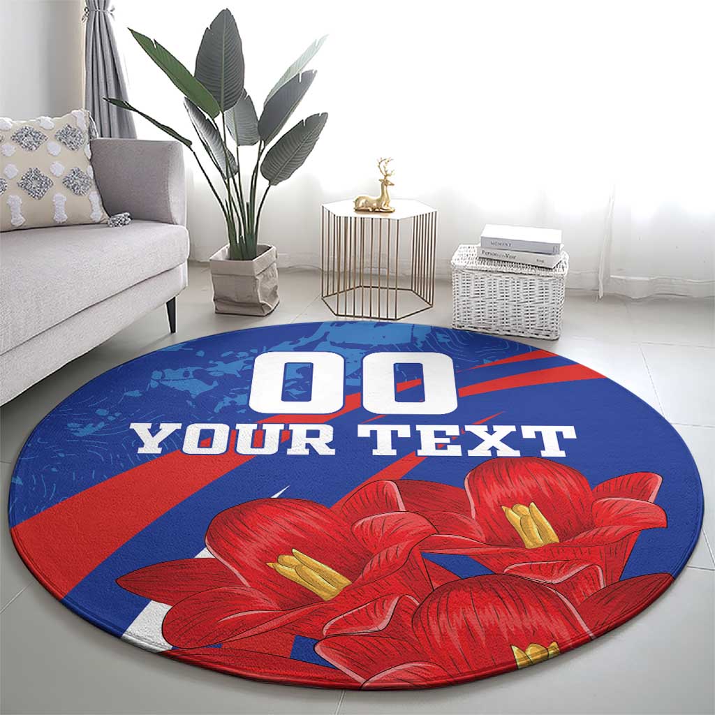 Round blue rug with red flowers and 'YOUR TEXT' lettering, vintage grunge