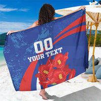 Blue sarong with red stripe and red flower graphic, custom text print.