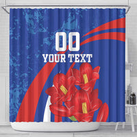 Blue shower curtain with red lily-like flowers, diagonal stripes, and '00 YOUR TEXT'