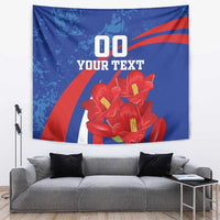 Blue wall tapestry with red flowers, diagonal stripes, and custom text layout