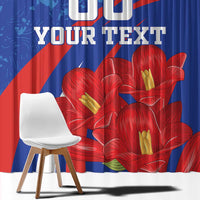 Close-up of blue window curtain fabric with red flower artwork and bold grunge stripes