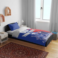 Blue and red Chile coat of arms duvet with 'YOUR TEXT', shown on bed with blue pillows
