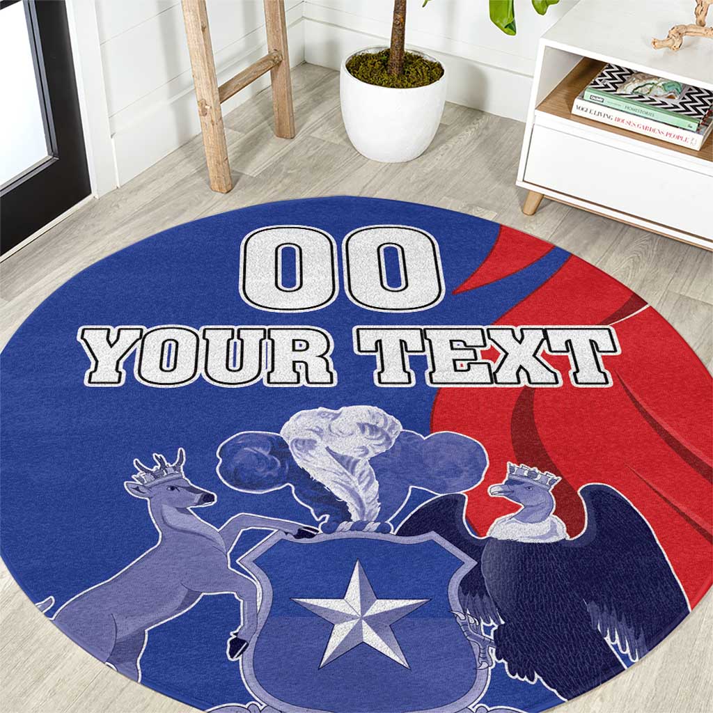 Round carpet rug close-up: blue-and-red design with 'YOUR TEXT' and '00' text.