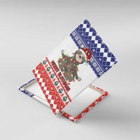 Rolled canvas prints set showing sloth artwork with “Merry Slothmas,” blue and red designs.