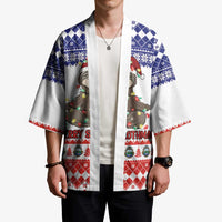 Unisex Christmas kimono worn: white base with sloth print, blue sleeve pattern, red hem