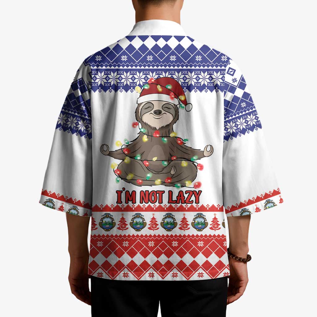 Unisex Christmas kimono back on model: sloth graphic, blue snowflake stripes, red diamond band