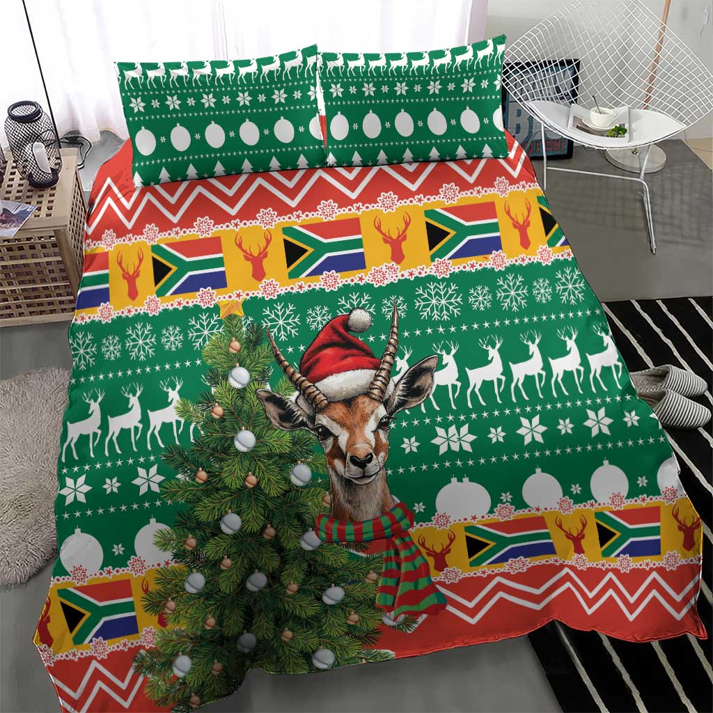 Christmas bedding set with green Springbok face in red hat, tree and deer pattern