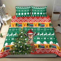Christmas bedding set with green duvet, red chevron border, and deer and Springbok print