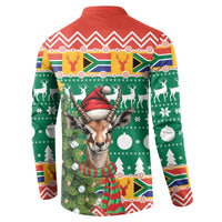 Back of Christmas button sweatshirt with springbok in Santa hat and holiday graphics