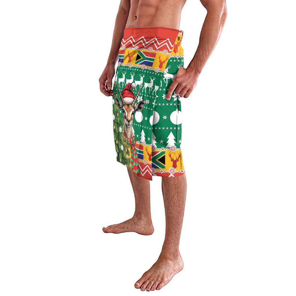 Green Christmas lavalava wrap skirt in side view with deer head, snowflakes and trees