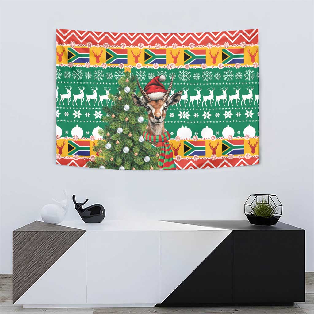 Square Christmas tapestry with springbok center design, green reindeer silhouettes and ornaments
