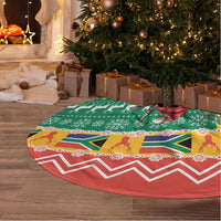 Round green Christmas tree skirt with Springbok and South Africa flag-inspired motifs