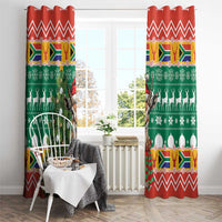 Hanging Christmas window curtains, green with red chevrons, springbok and South Africa flag motif