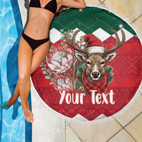 Round beach blanket with fringe, reindeer and flowers, green border with 'Your Text'