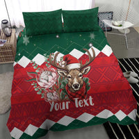 Christmas comforter set with green and red geometric pattern, deer wearing Santa hat, “Your Text”