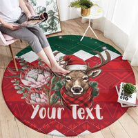 Round Christmas rug with deer, red patterns, and 'Your Text' across the center.