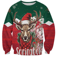 Unisex Christmas sweatshirt, red and green with reindeer face, Santa hat, and snowflakes