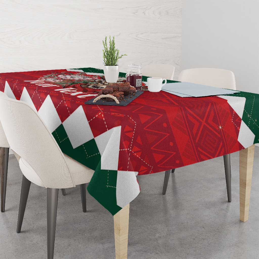 Christmas tablecloth with red and green geometric pattern and white border