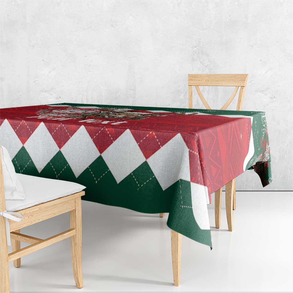 Red, green and white diamond Christmas tablecloth on table