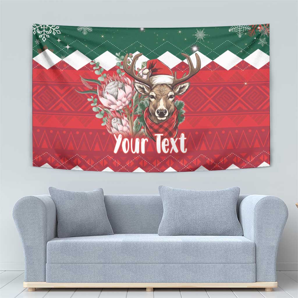 Green and red Christmas tapestry with springbok, floral accents, and “Your Text”.