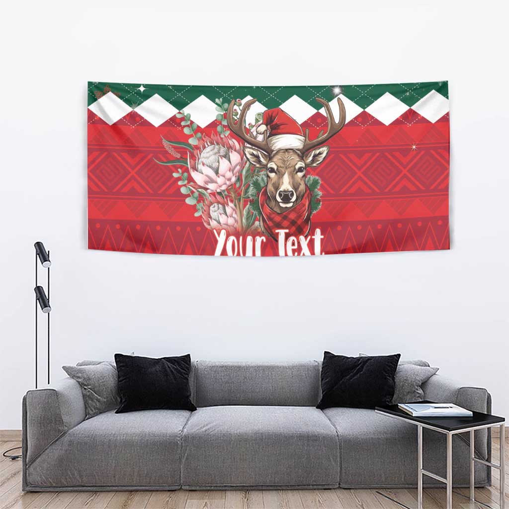 Green and red springbok Christmas tapestry with floral design and “Your Text”.