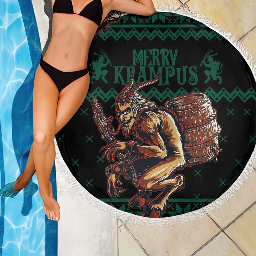 Round green beach blanket with fringe edge, Krampus graphic on black center beside pool