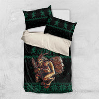 Green and black Krampus Christmas bedding set laid flat with pillow shams