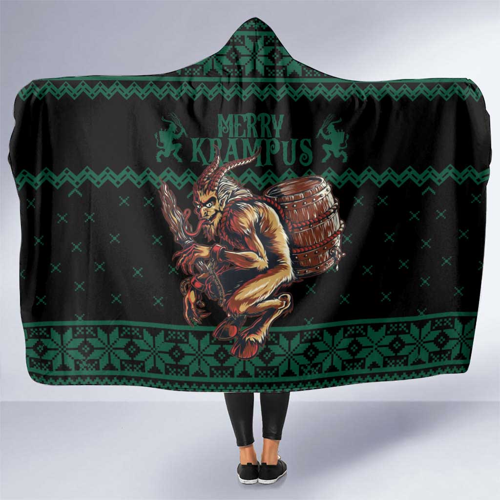 Green and black hooded blanket with Merry Krampus graphic and drumming demon
