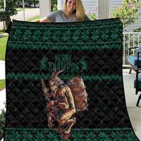 Green Christmas quilt with black backing and Krampus barrel graphic panel