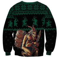 Green crewneck sweatshirt with Krampus and drum graphic, holiday pattern on back