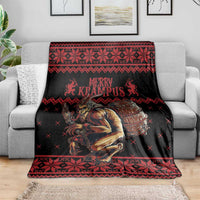 Krampus Christmas throw blanket in black and red with “Merry Krampus” lettering and creature artwork
