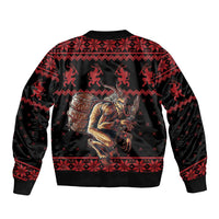 Red and black bomber jacket with Krampus and drum graphic, ribbed hem and zipper