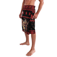 Red/black lavalava wrap skirt with central creepy figure panel and patterned borders