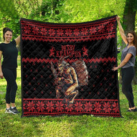 Black and red Christmas quilt featuring large Krampus graphic and zigzag border