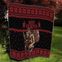 Black and red quilt with Merry Krampus text and barrel character, outdoor view