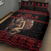 Black quilt bed set with red geometric border and Krampus figure, two pillow shams