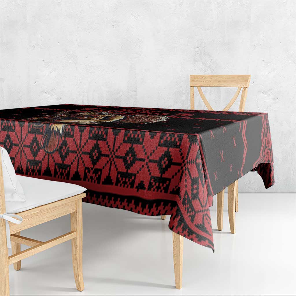 Red and black geometric holiday tablecloth covering table and hanging edge