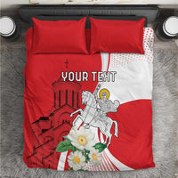 Red and white personalized bedding set with two pillows and floral knight graphic
