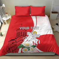 Red and white duvet set with two pillows, 'YOUR TEXT' print and knight-on-horse art
