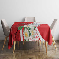 Red and white tablecloth with floral bouquet and church-style illustration pattern