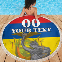Round beach blanket with fringed edge showing flag design, '00' and custom text