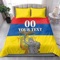 Bedding set on light bed with two yellow pillows; red, blue, and yellow cover with "00 YOUR TEXT".