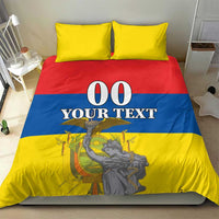 Bedding set with yellow, red, and blue comforter and pillows; "00 YOUR TEXT" design.