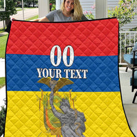 Red, blue, and yellow personalized quilt with “00 YOUR TEXT” and independence monument artwork.